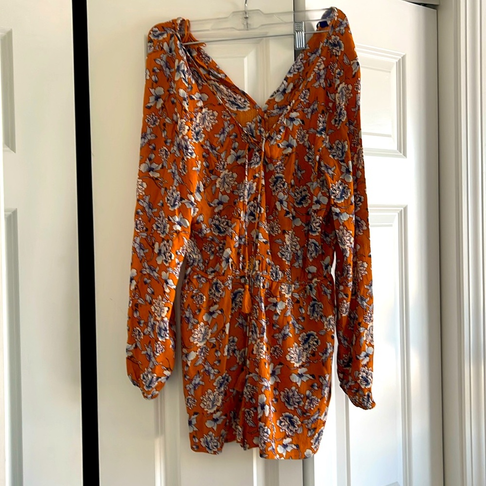 Orange shorts romper. Good condition.